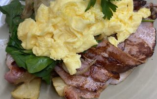 Scrambled eggs, bacon on sour dough or toast of your choice