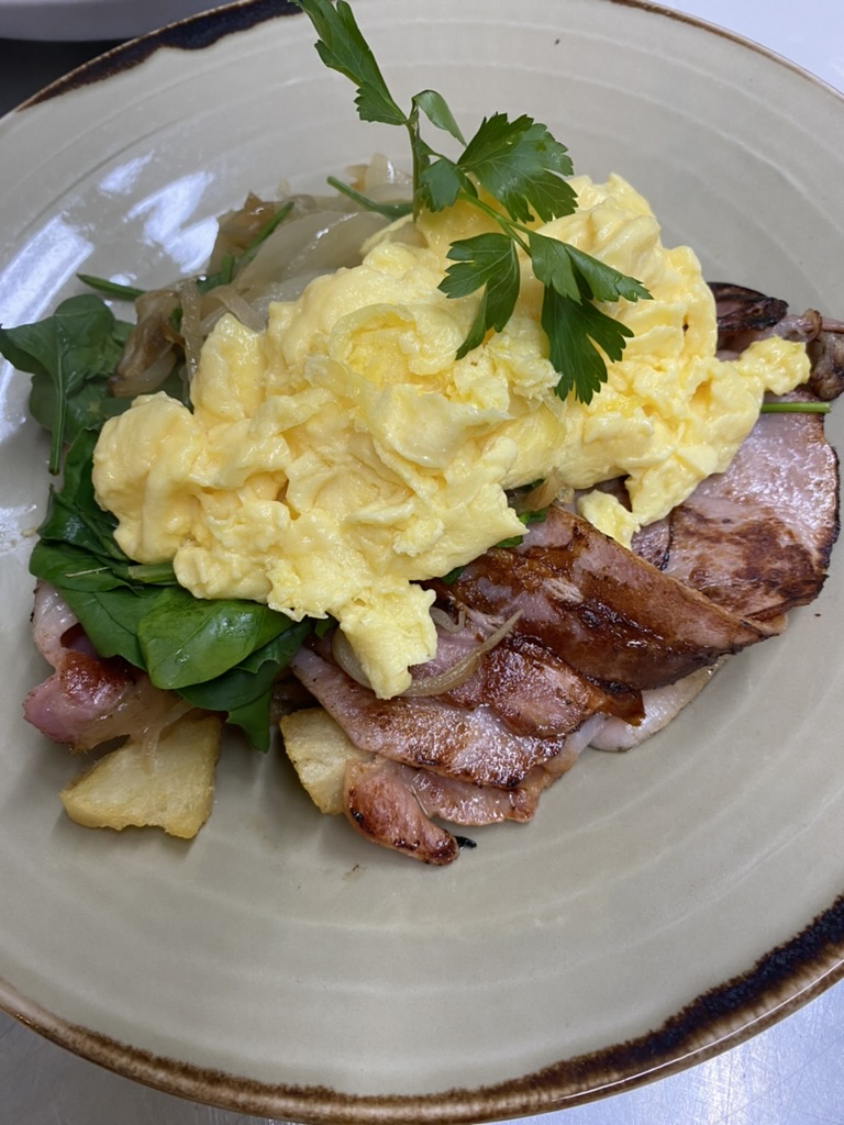 Scrambled eggs, bacon on sour dough or toast of your choice
